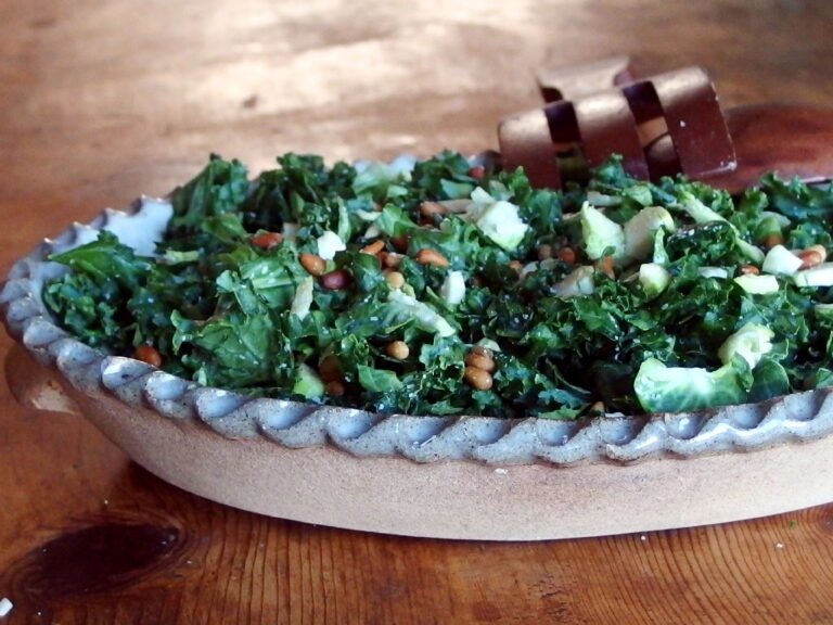Raw Kale and Brussels Sprouts Salad with Toasted Pinenuts and Parmesan Cheese