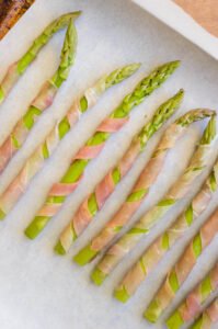 Prosciutto Wrapped Asparagus with Lemon Dijon Vinaigrette